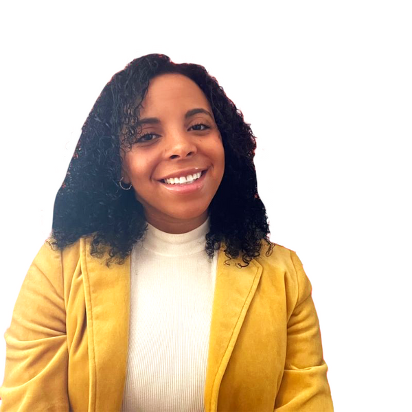 A woman smiling at the camera.