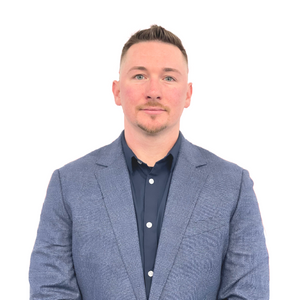 Man smiling at the camera.